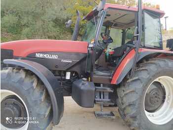 Tracteur agricole NEW HOLLAND M100: photos 1