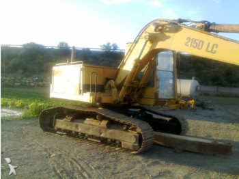 Pelle sur chenille Caterpillar 215 B LC: photos 1