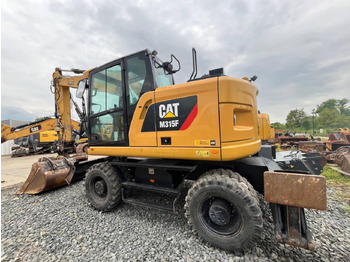 Pelle sur pneus CAT M315F: photos 4