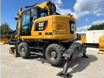 Pelle sur pneus CAT M315F: photos 4 Pelle sur pneus CAT M315F: photos 4