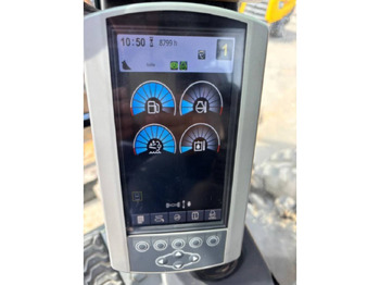 Pelle sur pneus CAT M315F: photos 5 Pelle sur pneus CAT M315F: photos 5