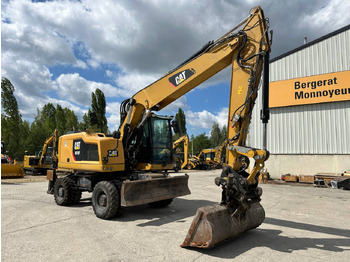 Pelle sur pneus CAT M318F: photos 2