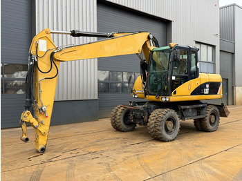 Pelle sur pneus Caterpillar M315D: photos 2