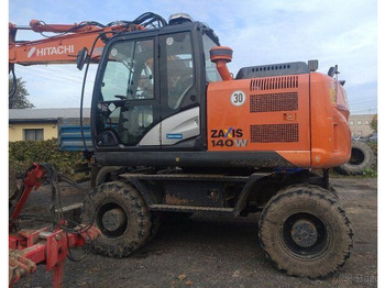 Pelle sur pneus HITACHI ZX140W-5