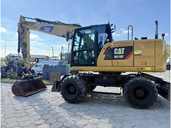 Pelle sur pneus CATERPILLAR M318F