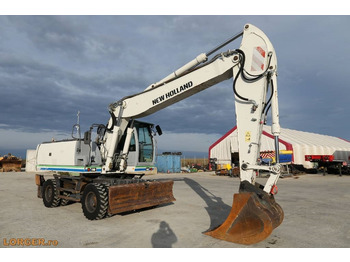 Pelle sur pneus New Holland MH 6.6 + Sandvic Hammer: photos 5