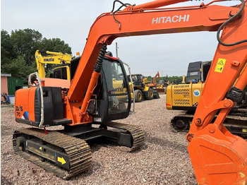 Pelle sur chenille Hitachi ZX70: photos 4