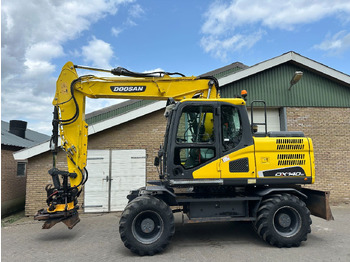 Pelle sur pneus DOOSAN DX140W-5
