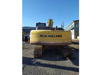 Pelle sur chenille New Holland E 265 C: photos 3