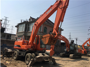 Pelle sur pneus DOOSAN DH210W-7
