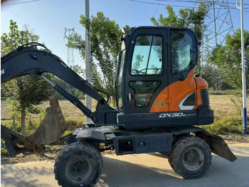 Pelle sur pneus DOOSAN DX60W