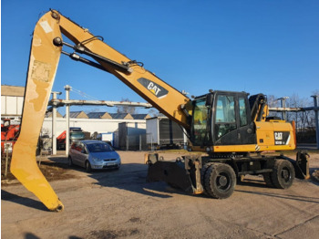 Pelle de manutention Caterpillar 318 D MH: photos 2