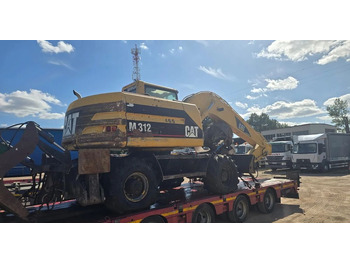 Pelle sur pneus Caterpillar M312: photos 3