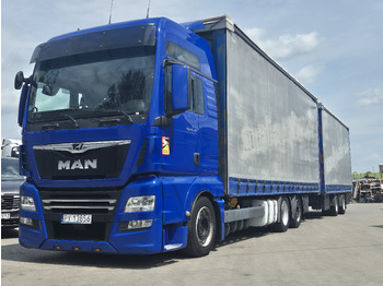 Camion à rideaux coulissants MAN TGX 24.500