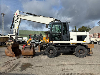 Pelle sur pneus CATERPILLAR M316D