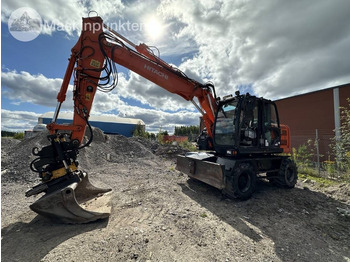 Pelle sur pneus HITACHI ZX140W-5