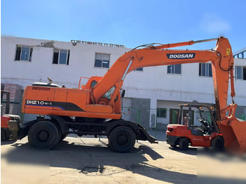 Pelle sur pneus DOOSAN DH210W-7