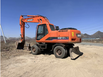 Pelle sur pneus DOOSAN DH210W-7
