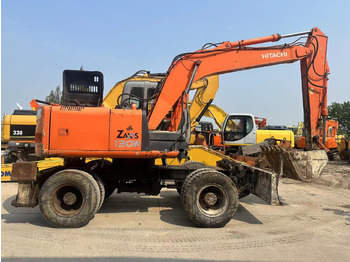 Pelle sur pneus HITACHI ZX130