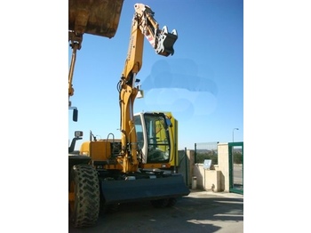 Pelle sur pneus LIEBHERR A309: photos 1