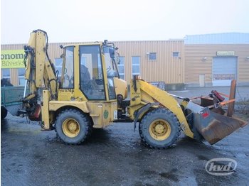 Tractopelle Komatsu WB70A Backhoe loader with trailer and equipment: photos 1
