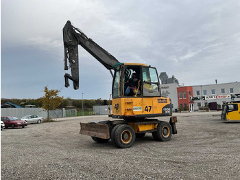 Pelle sur pneus VOLVO EW140C
