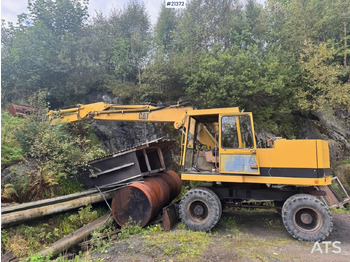 Pelle sur pneus CATERPILLAR