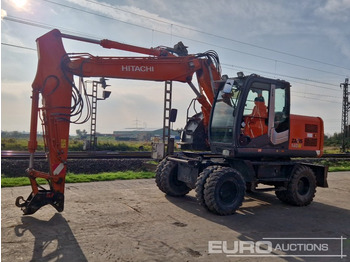 Pelle sur pneus HITACHI ZX140W-3