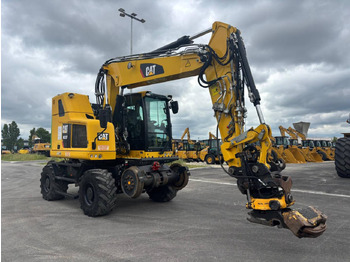 Pelle sur pneus CATERPILLAR M323F