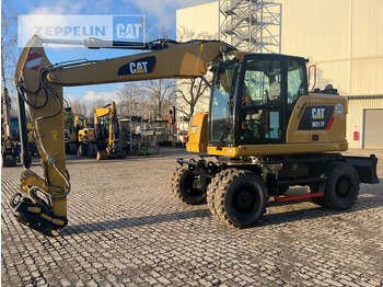 Pelle sur pneus CATERPILLAR