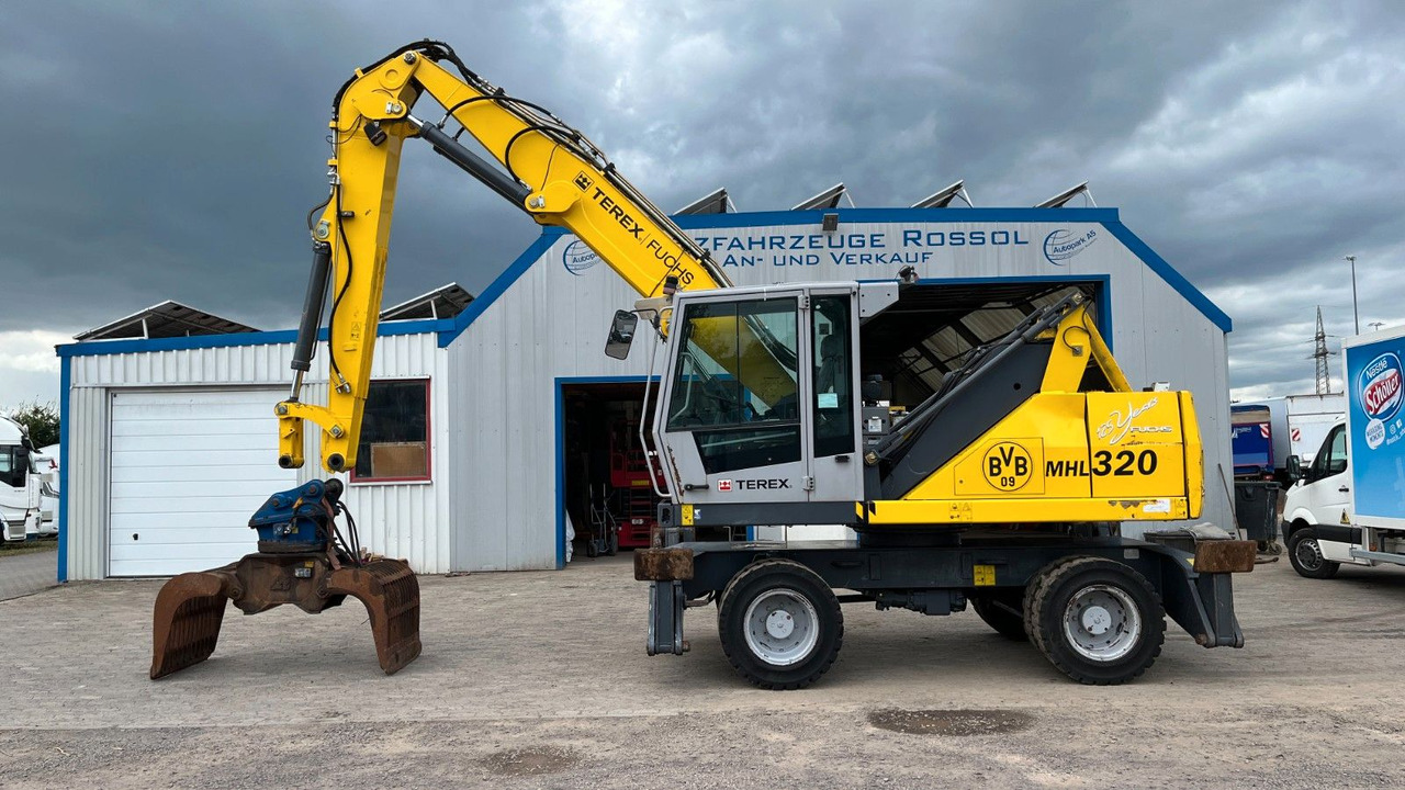 Fuchs TeRex MHL 320 D Umschlagbagger Greifer Pratzen - Pelle de manutention: photos 1 Fuchs TeRex MHL 320 D Umschlagbagger Greifer Pratzen - Pelle de manutention: photos 1