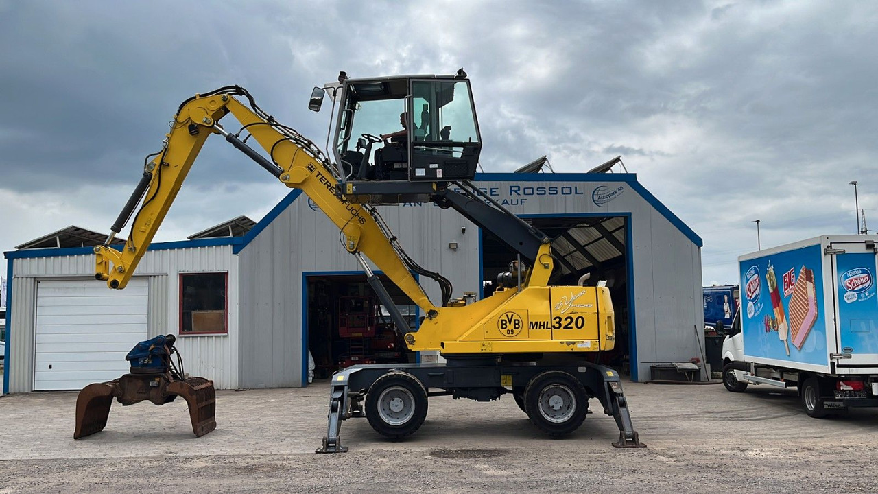Fuchs TeRex MHL 320 D Umschlagbagger Greifer Pratzen - Pelle de manutention: photos 2 Fuchs TeRex MHL 320 D Umschlagbagger Greifer Pratzen - Pelle de manutention: photos 2