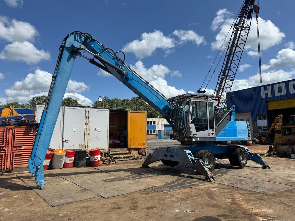 Fuchs MHL 335 - Pelle de manutention: photos 1 Fuchs MHL 335 - Pelle de manutention: photos 1