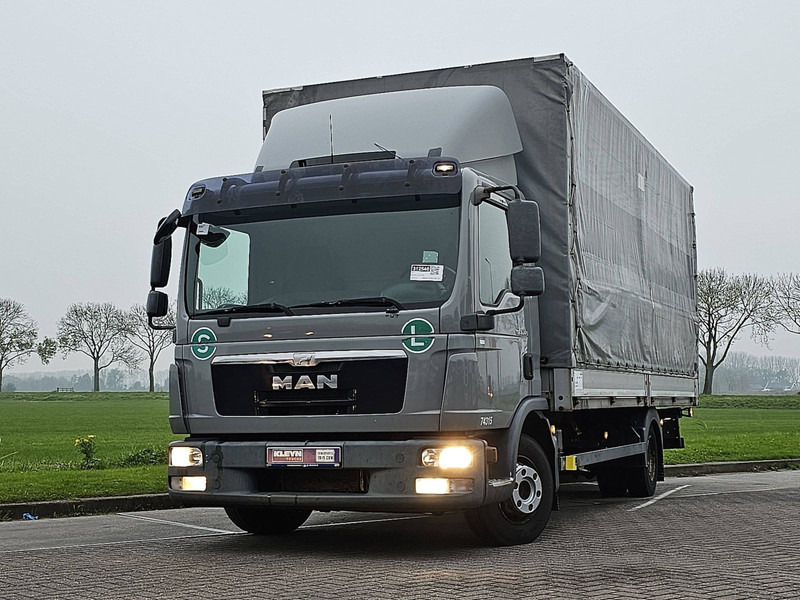 MAN 8.220 TGL MANUAL LIFT AIRCO - Camion à rideaux coulissants: photos 1 MAN 8.220 TGL MANUAL LIFT AIRCO - Camion à rideaux coulissants: photos 1