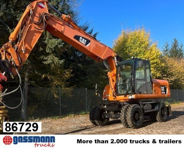 CAT M318D Mobilbagger - Engins de chantier: photos 1 CAT M318D Mobilbagger - Engins de chantier: photos 1