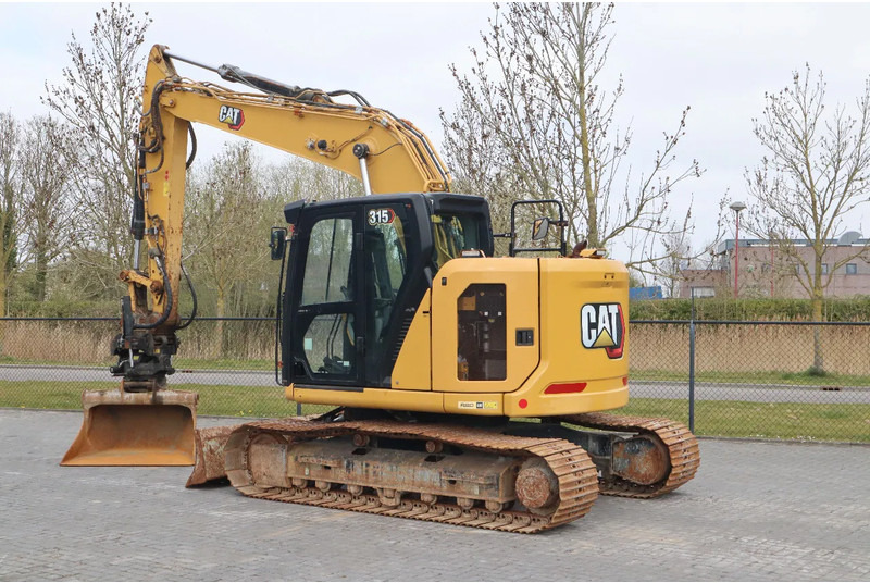 Caterpillar 315 07B | ROTOTILT | BUCKET | DOZERBLADE - Pelle sur pneus: photos 3 Caterpillar 315 07B | ROTOTILT | BUCKET | DOZERBLADE - Pelle sur pneus: photos 3