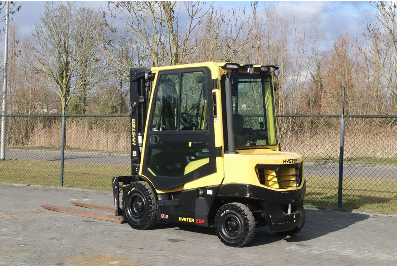 Hyster H2.5 A | BOOM SUSPENSION | SIDESHIFT | FORK EXTENTIONS | FORK POSITIONERS - Chariot élévateur diesel: photos 3 Hyster H2.5 A | BOOM SUSPENSION | SIDESHIFT | FORK EXTENTIONS | FORK POSITIONERS - Chariot élévateur diesel: photos 3