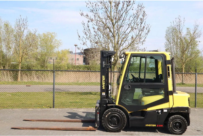 Hyster H2.5 A | BOOM SUSPENSION | SIDESHIFT | FORK EXTENTIONS | FORK POSITIONERS - Chariot élévateur diesel: photos 1 Hyster H2.5 A | BOOM SUSPENSION | SIDESHIFT | FORK EXTENTIONS | FORK POSITIONERS - Chariot élévateur diesel: photos 1
