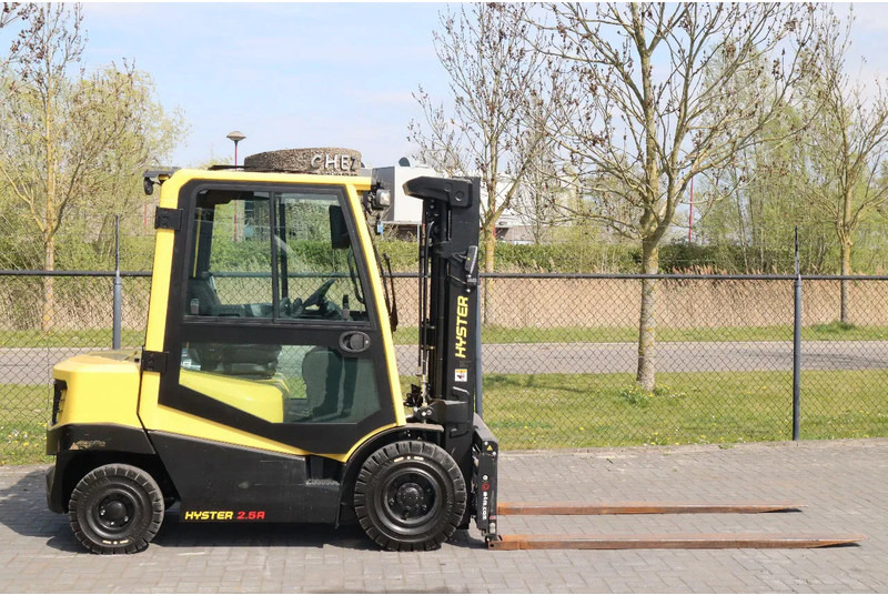 Hyster H2.5 A | BOOM SUSPENSION | SIDESHIFT | FORK EXTENTIONS | FORK POSITIONERS - Chariot élévateur diesel: photos 4 Hyster H2.5 A | BOOM SUSPENSION | SIDESHIFT | FORK EXTENTIONS | FORK POSITIONERS - Chariot élévateur diesel: photos 4