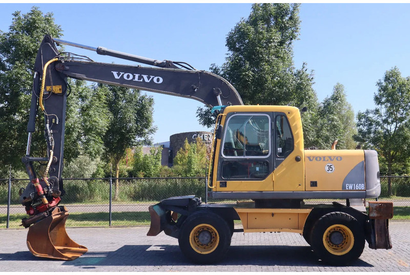 Volvo EW160B | EW 160 B | TILT ROTATOR | BUCKET | OUTRIGGERS | BLADE - Pelle sur pneus: photos 1 Volvo EW160B | EW 160 B | TILT ROTATOR | BUCKET | OUTRIGGERS | BLADE - Pelle sur pneus: photos 1