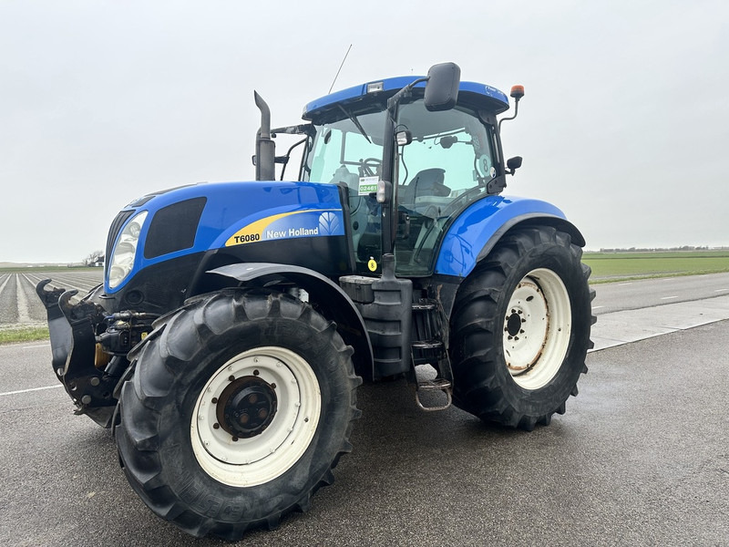 New Holland T6080 - Tracteur agricole: photos 1 New Holland T6080 - Tracteur agricole: photos 1