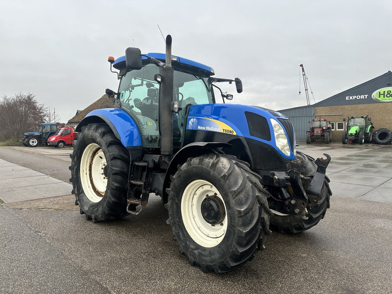 New Holland T6080 - Tracteur agricole: photos 4 New Holland T6080 - Tracteur agricole: photos 4