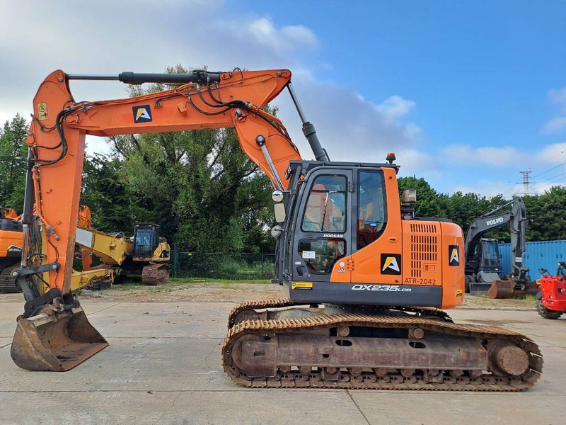 Doosan DX 235 LCR-5 - Pelle sur chenille: photos 1 Doosan DX 235 LCR-5 - Pelle sur chenille: photos 1