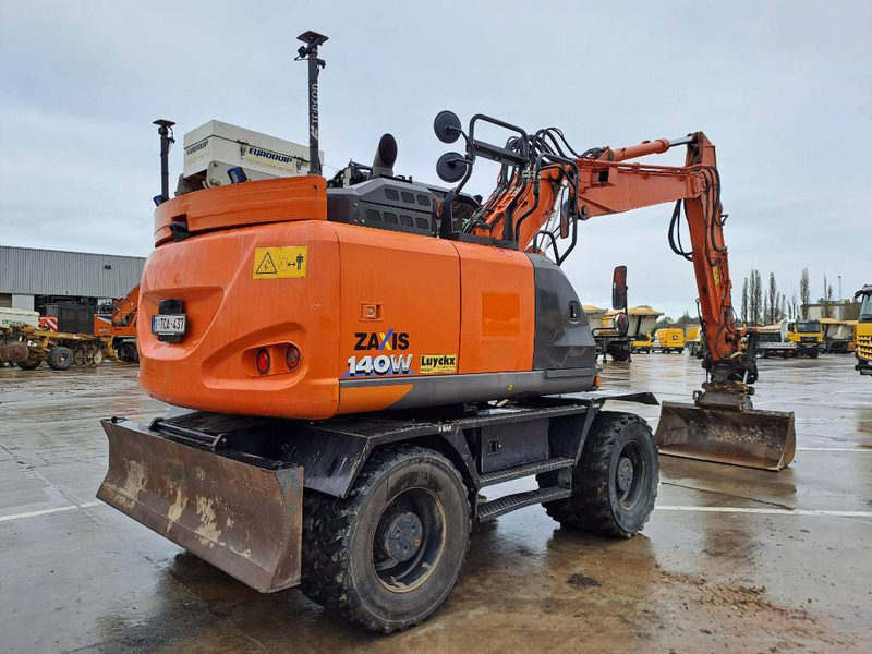 Hitachi ZX140WTB-6 (Topcon GPS + Engcon) - Pelle sur pneus: photos 4 Hitachi ZX140WTB-6 (Topcon GPS + Engcon) - Pelle sur pneus: photos 4