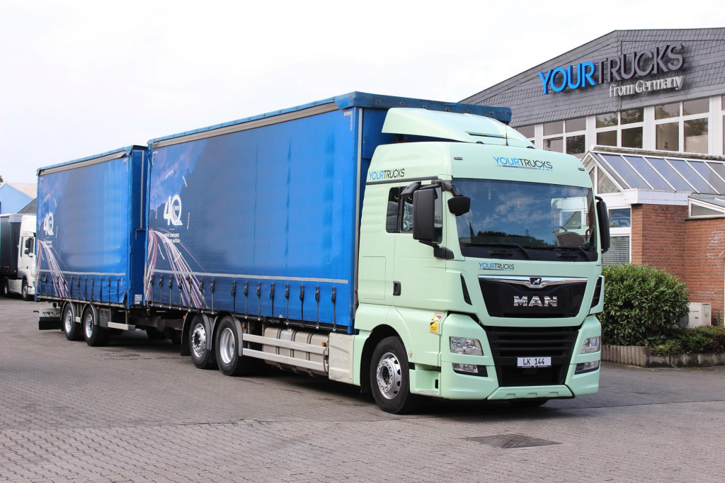 MAN TGX 26.460 Retarder Jumbo-Zug 120M3 Durchlade - Camion à rideaux coulissants: photos 1 MAN TGX 26.460 Retarder Jumbo-Zug 120M3 Durchlade - Camion à rideaux coulissants: photos 1