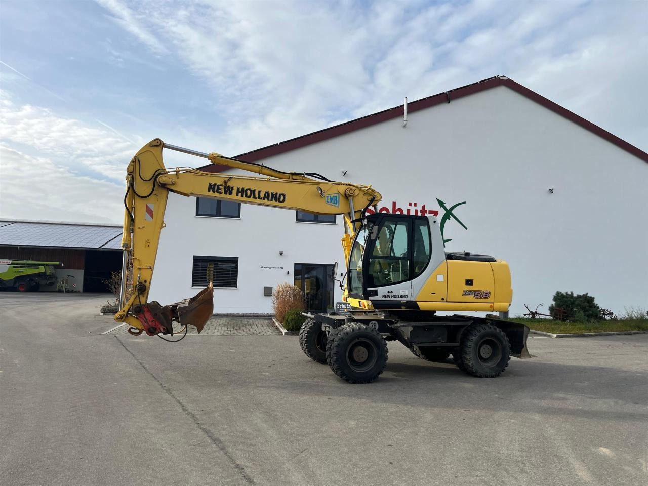 New Holland MH 5.6 inkl. Grabenlöffel, Tieflöffel - Pelle sur pneus: photos 3 New Holland MH 5.6 inkl. Grabenlöffel, Tieflöffel - Pelle sur pneus: photos 3