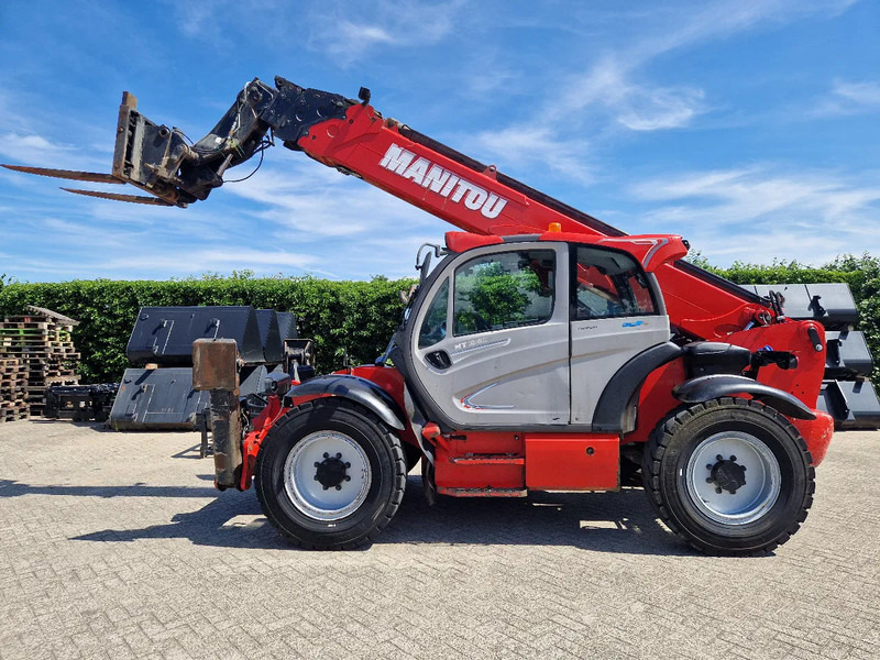Manitou MT1840 100P St4 - Chariot télescopique: photos 1 Manitou MT1840 100P St4 - Chariot télescopique: photos 1