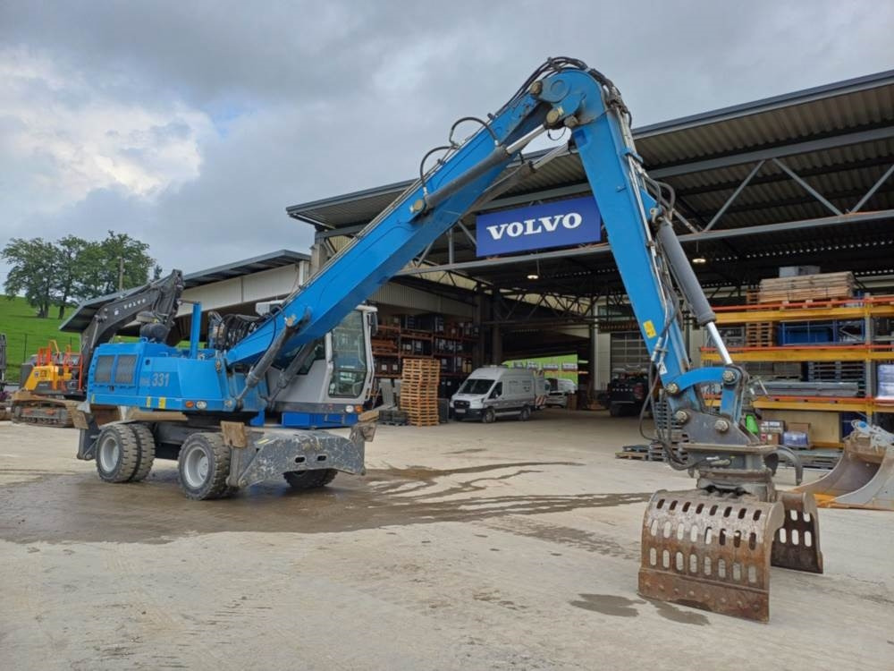 Fuchs MHL 331 - Pelle de manutention: photos 1 Fuchs MHL 331 - Pelle de manutention: photos 1