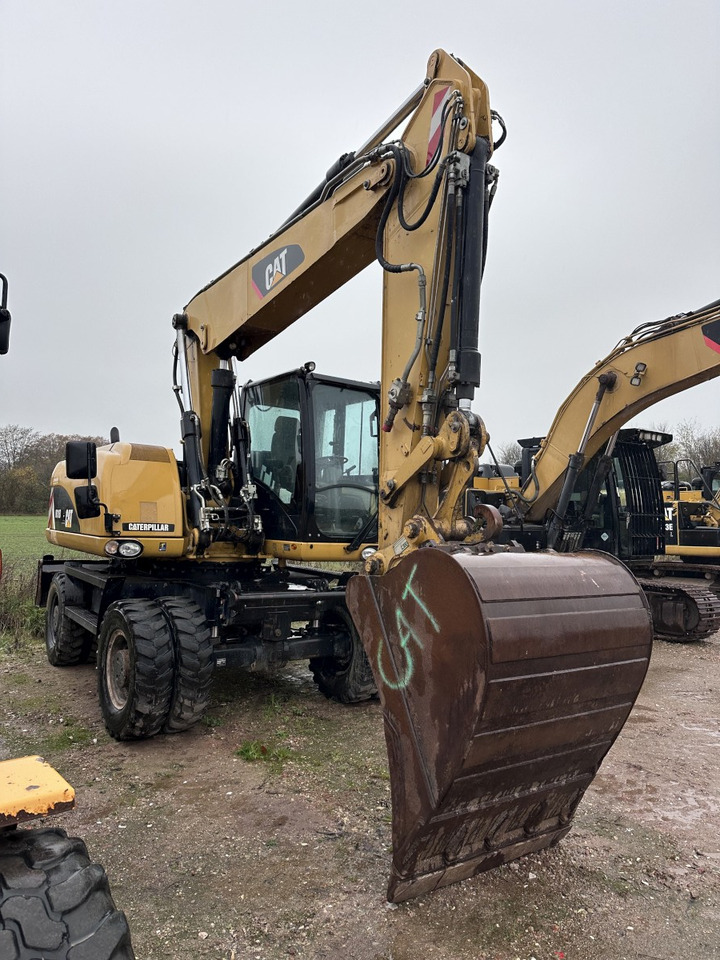 CATERPILLAR M 316 D full Hydr. Top Zustand German machine ! - Pelle sur pneus: photos 4 CATERPILLAR M 316 D full Hydr. Top Zustand German machine ! - Pelle sur pneus: photos 4