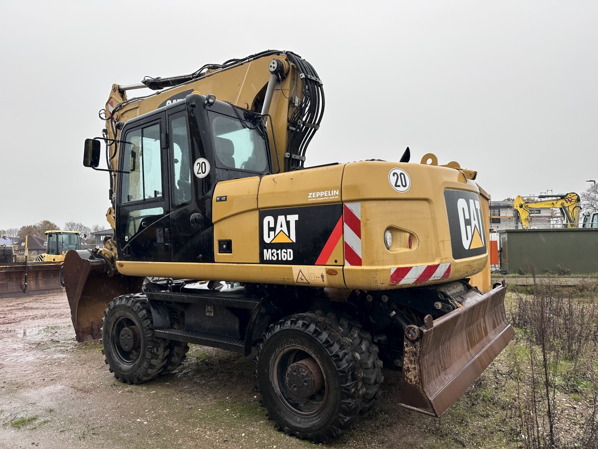 CATERPILLAR M 316 D full Hydr. Top Zustand German machine ! - Pelle sur pneus: photos 2 CATERPILLAR M 316 D full Hydr. Top Zustand German machine ! - Pelle sur pneus: photos 2